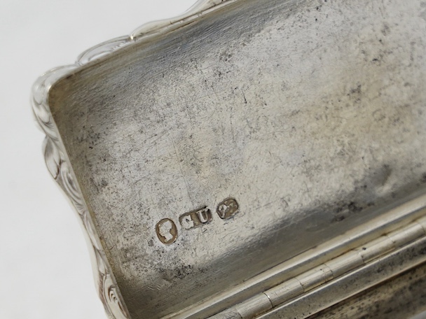 A Victorian engraved snuff box, by George Unite, Birmingham, 1853, 61mm. Condition - fair